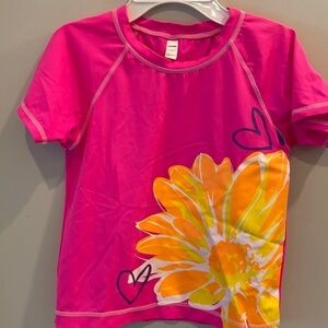 Joe Boxer - girls swim shirt.  size large.  Pink with flower.